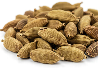 Fototapeta premium Close-Up of Dried Cardamom Seeds Scattered on White Background Showcasing Their Rich Texture and Natural Aroma