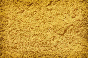 Brown yellow sand stone rough texture natural patterns wall background