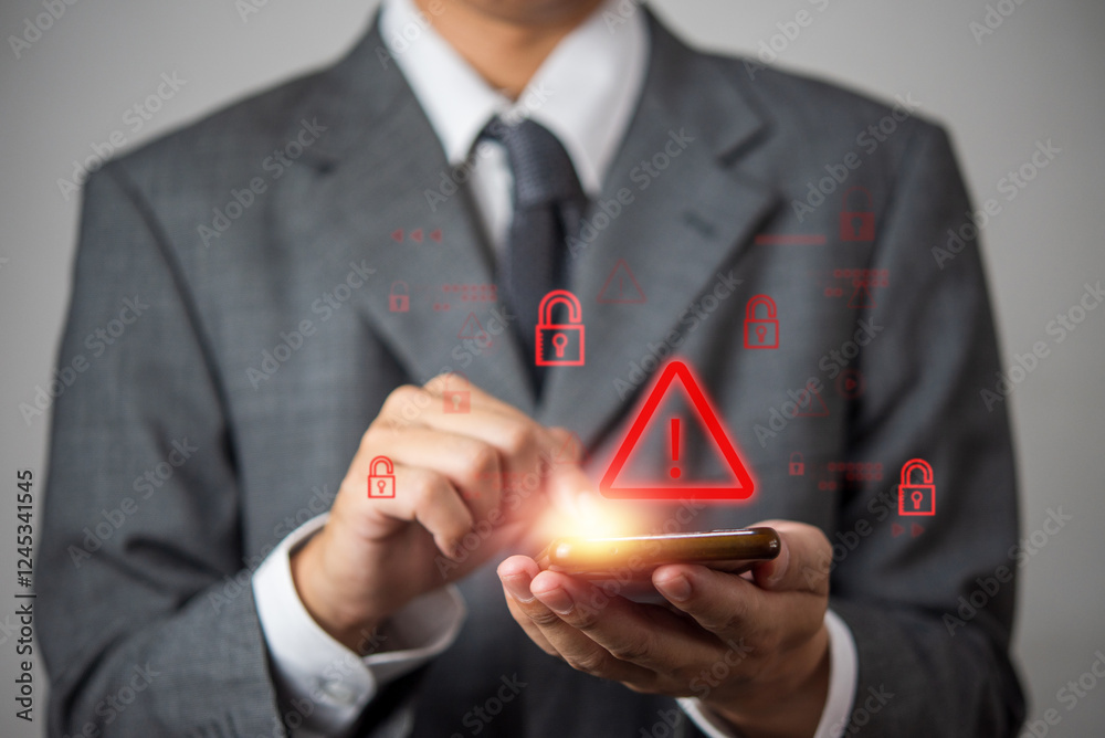 Wall mural cybersecurity warning concept with a businessman using a smartphone. digital security threat, hackin