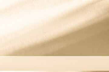 Obraz premium Wall interior background, studio and backdrops show products. with leaf shadow from window color beige and white. background for text insertion and presentation of product 