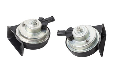 Pair of electric black plastic horns in retro style - car horn on white isolated background in...