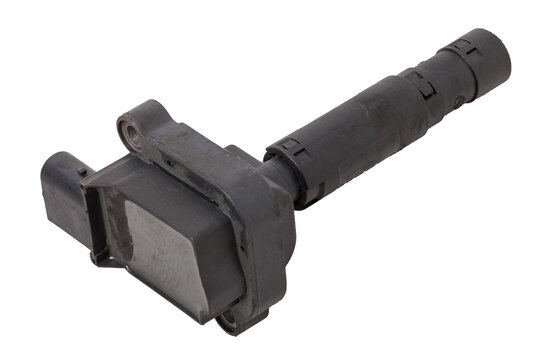 Black ignition coil for engine, isolated on white background. Spare parts for vehicle repair in garage.