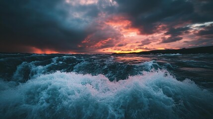 Fototapeta premium Dramatic ocean sunset, waves crashing, stormy sky, coastal landscape, nature photography