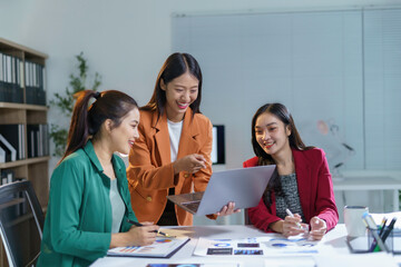 Team of Businesswomen Collaborating on a Project