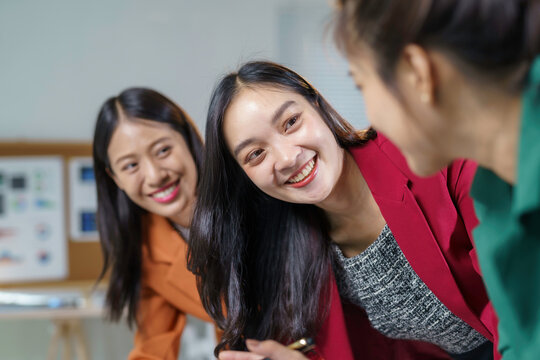 Collaborative team of young professionals engaging in discussion