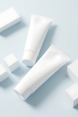 Two White Cosmetic Tubes Mockup With Light Blue Cubes, A Minimalist Product Arrangement For Skincare Or Beauty Promotion, Clean And Simple