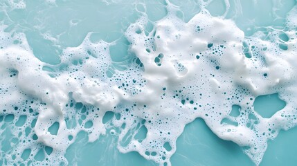 Naklejka premium Fluffy white clouds drifting across a bright blue sky, perfect for nature themes, serene atmosphere, copy space available.