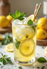 Fototapeta premium Refreshing Lemonade with Mint and Ice Cubes in Glass