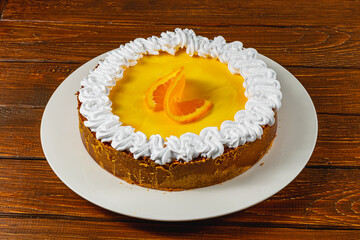 Delightful homemade orange cheesecake paired with aromatic espresso coffee