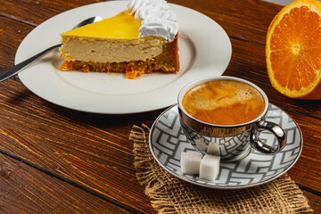 Delightful homemade orange cheesecake served with rich espresso coffee