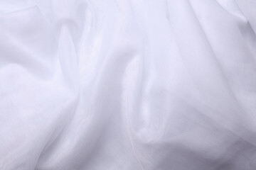 Fototapeta premium White tulle texture close up. Fabric background
