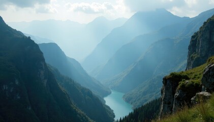 Obraz premium Towering gorge cuts through mist-shrouded peaks, solitude, landscape