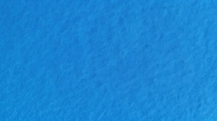 Obraz premium Blue Felt Background Texture for Creative Uses, Ideal for Design Projects, Photography, and Art Presentations – Vibrant Flat Surface.Blue felt fabric. Blue felt texture. Blue blank surface.
