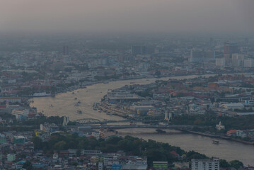 PM 2.5 dust in the atmosphere in the city,blurred sky dark with air pollution smoke cloud dust mist for background, problem in atmosphere sky environment, toxic pollution in atmosphere smog mist for