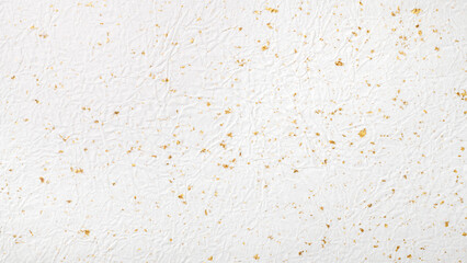 金箔を散らした、しわ加工のある紙の背景テクスチャー