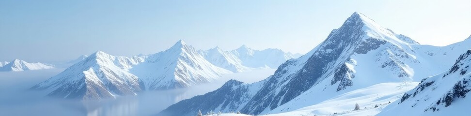 Fototapeta premium A snow-covered mountain range with a few snowflakes gently falling, snowfall, calm