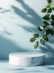 Minimalist Marble Product Display Podium with Branch and Leaf Shadow on a Blue Background for Modern Presentations