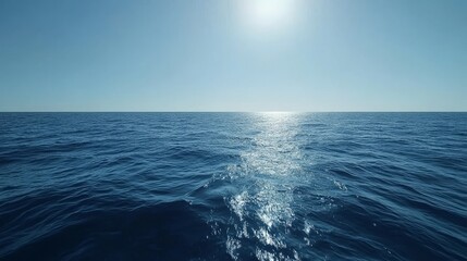 Fototapeta premium calm sea surface patterns, infinite blue expanse, delicate water movements, peaceful oceanic mood, subtle wave textures, minimal horizon composition, dreamy marine atmosphere