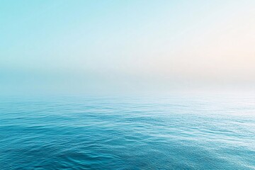 Fototapeta premium Serene Ocean Waters Under a Misty Sky
