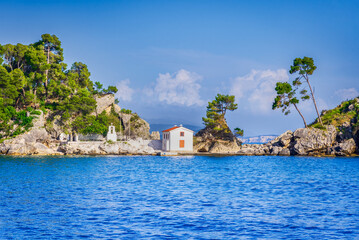 Parga, Greece. Panagia Chapel  and turquoise Ionian Sea waters, Greek holiday