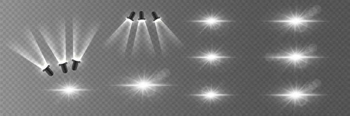 Set of light stars and flare, light spotlights, podium light. On a transparent background.