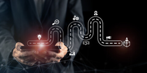 New product development and project roadmap concept. Business professional using tablet with...