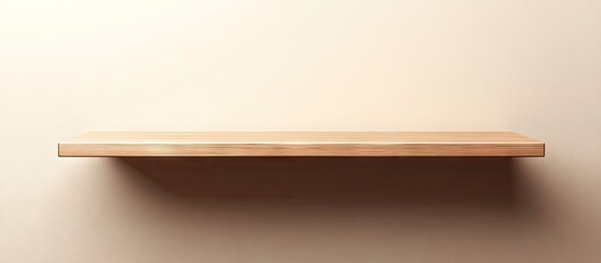 Empty wooden shelf against a soft beige wall, offering a clean and minimalistic space for text or item display in a well-lit environment.