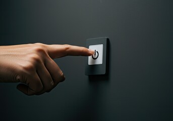 person pressing power button