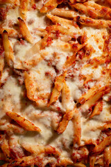 Cheesy baked ziti with marinara sauce