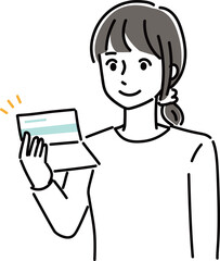 通帳を持つ女性