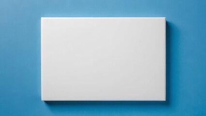 Fototapeta premium White canvas on a blue background, emphasizing modern minimalism and vibrant design