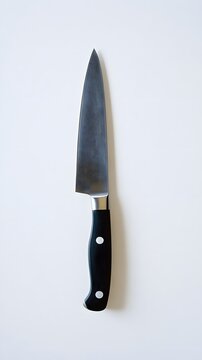 42. A minimalist cooking knife with a slim blade and dark handle on a bright white background
