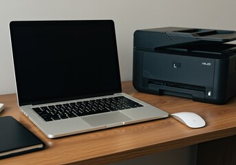 computer laptop and printer on a desk