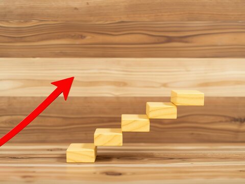 Yellow abstract background with a red arrow pointing down, wooden stairs block at the bottom symbolizing a decrease in business growth, arrow, red, wooden