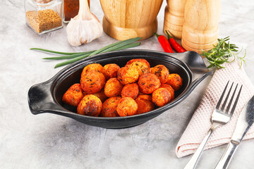 Baked young potato with paprika