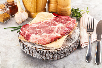 Raw pork neck steak for grill