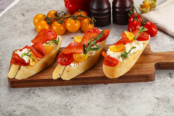 Bruschetta tapas with chorizo and tomato