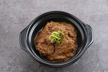 Rendang Daging Sapi, traditional food from Padang, Indonesia. Beef stew with spices, herbs and coconut milk
