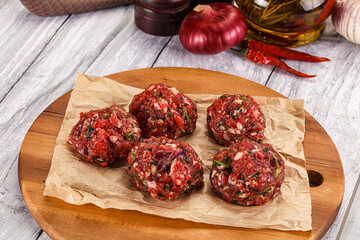 Raw beef meatballs for cooking