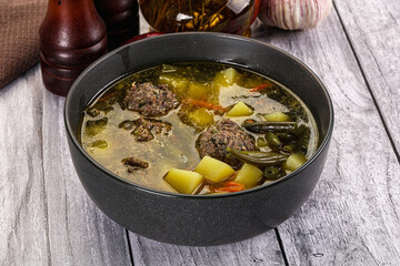 Soup with beef meatballs and vegetables
