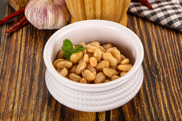 Baked white canned beans in the bowl