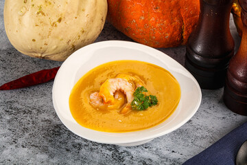 Pumpkin cream soup with prawns