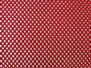 Red mesh fabric used for making clothes or bags.