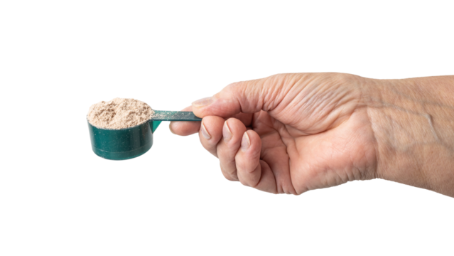 Senior female hand holding a portion of whey protein powder in a measuring spoon, isolated on a transparent background