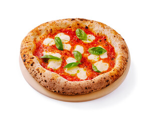 Delicious margherita pizza with fresh basil leaves served on a wooden plate