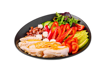 Healthy grilled chicken salad with fresh vegetables and quinoa served in a black bowl