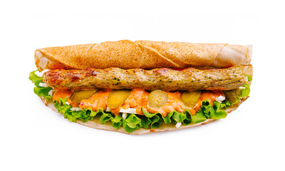 Savory grilled kebab sandwich with fresh vegetables served on a warm pita bread for a delicious meal experience