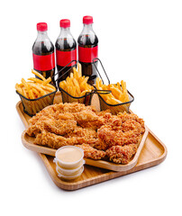 Delicious fried chicken with crispy fries and soft drinks perfect for a casual meal