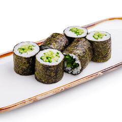 Delicious cucumber sushi rolls served on a white plate in a bright setting