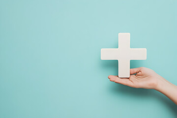 Obraz premium Hand holding plus sign virtual means to offer positive things (such as benefits, personal development, social networking, health insurance), light blue background theme